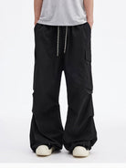 MEDM Multi Pocket Parachute Cargo Pants in Black - On Model