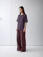 Random Piece Distressed Cotton Blend T Shirt in Purple - On Female Model