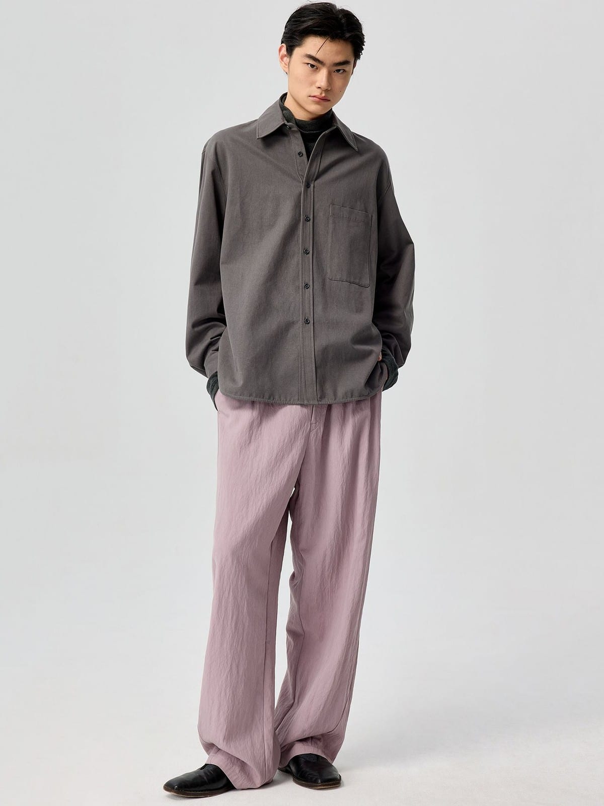 SIMPLE PROJECT Lyocell Blend Curved Leg Trousers in Lavender - On Male Model