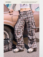 BeerBro Graffiti Plaid Strap Cargo Pants in Sky Blue - On Female Model