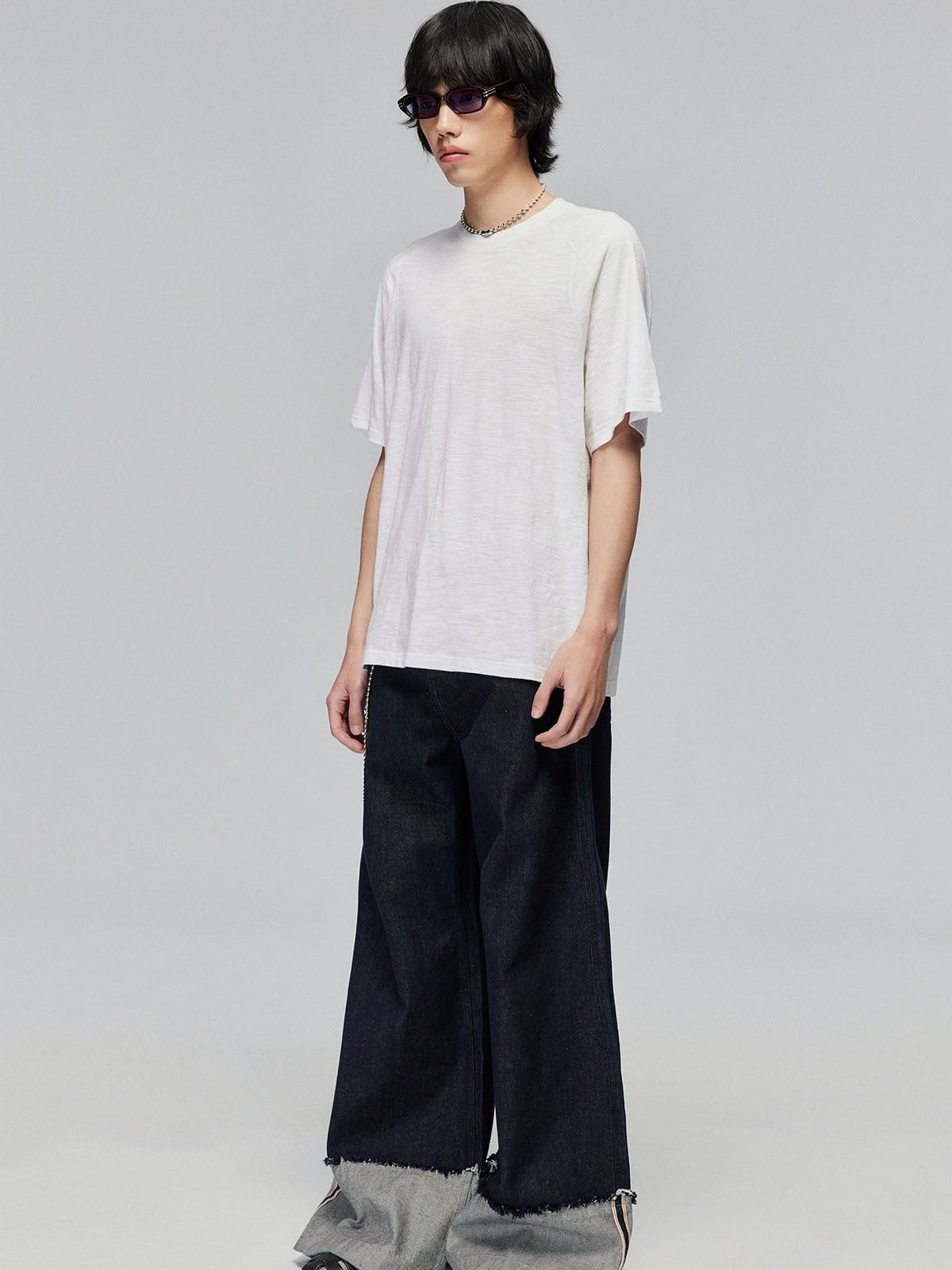 SIMPLE PROJECT Washed Slub Cotton Raglan Tee in White - On Male Model