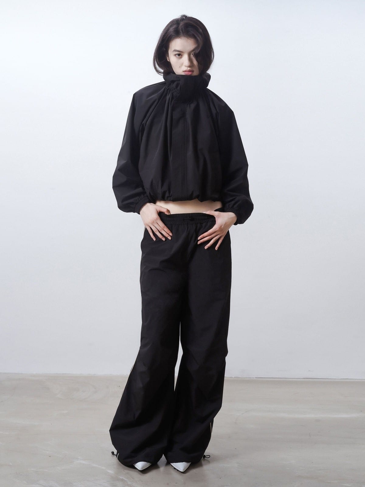 RARELY ALIKE Adjustable Collar Balloon Sports Jacket in Black - On Female Model