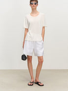 MSBEAST Rolled Edge Silk Cotton U Neck T Shirt in White - On Female Model