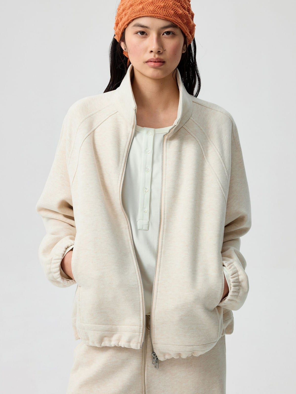 SIMPLE PROJECT Ruffled Adjustable Collar Zip Hoodie in Beige - On Female Model