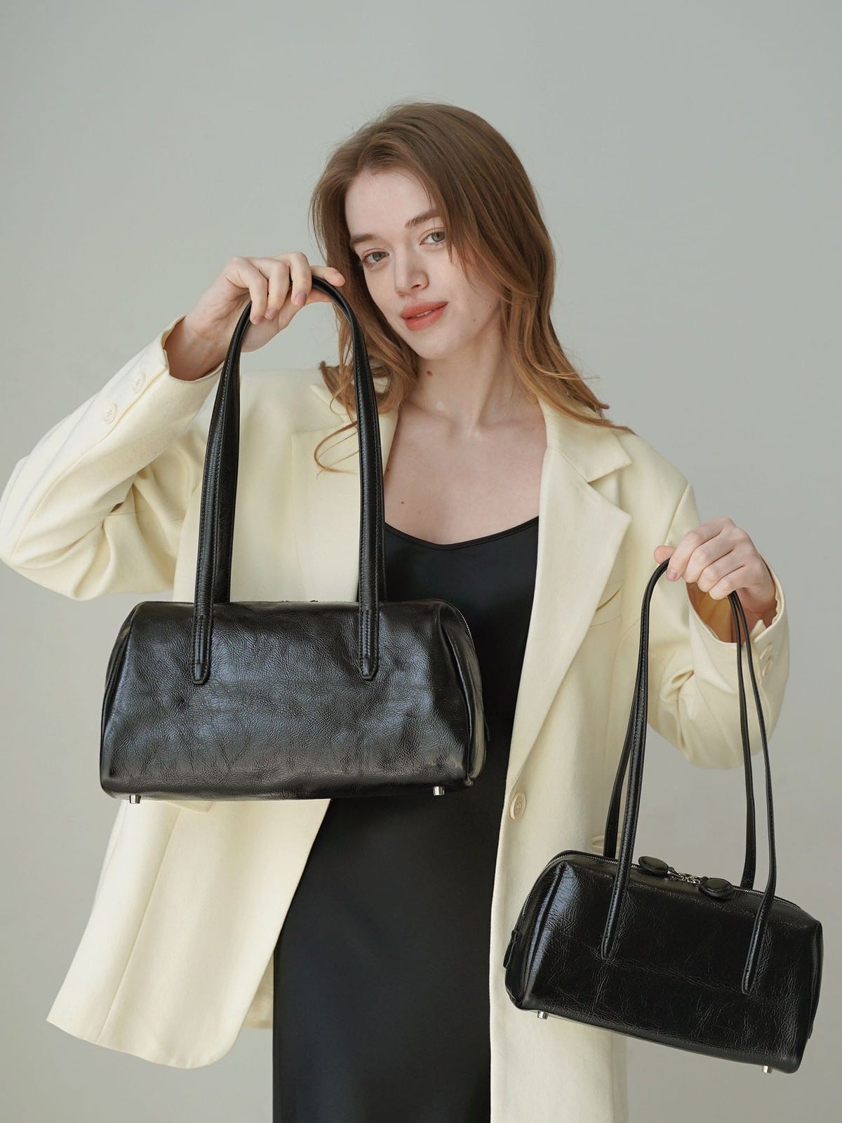 PANLULUPAN Oil Wax Leather Pillow Shoulder Bag in Cream - On Female Model