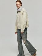 SIMPLE PROJECT Distressed Vintage Wash Flare Jeans in Blue - On Female Model