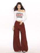 BIGGOLD STUDIO Deconstructed Curved Seam Trousers in Burgundy - On Female Model
