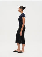RARELY ALIKE Pure Wool Short Sleeve Cardigan in Navy Blue - On Female Model