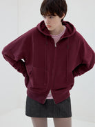SIMPLE PROJECT Cotton Blend Zip Up Hoodie in Burgundy - On Female Model