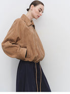 MSBEAST Cropped Leather Drawstring Jacket in Beige - On Female Model