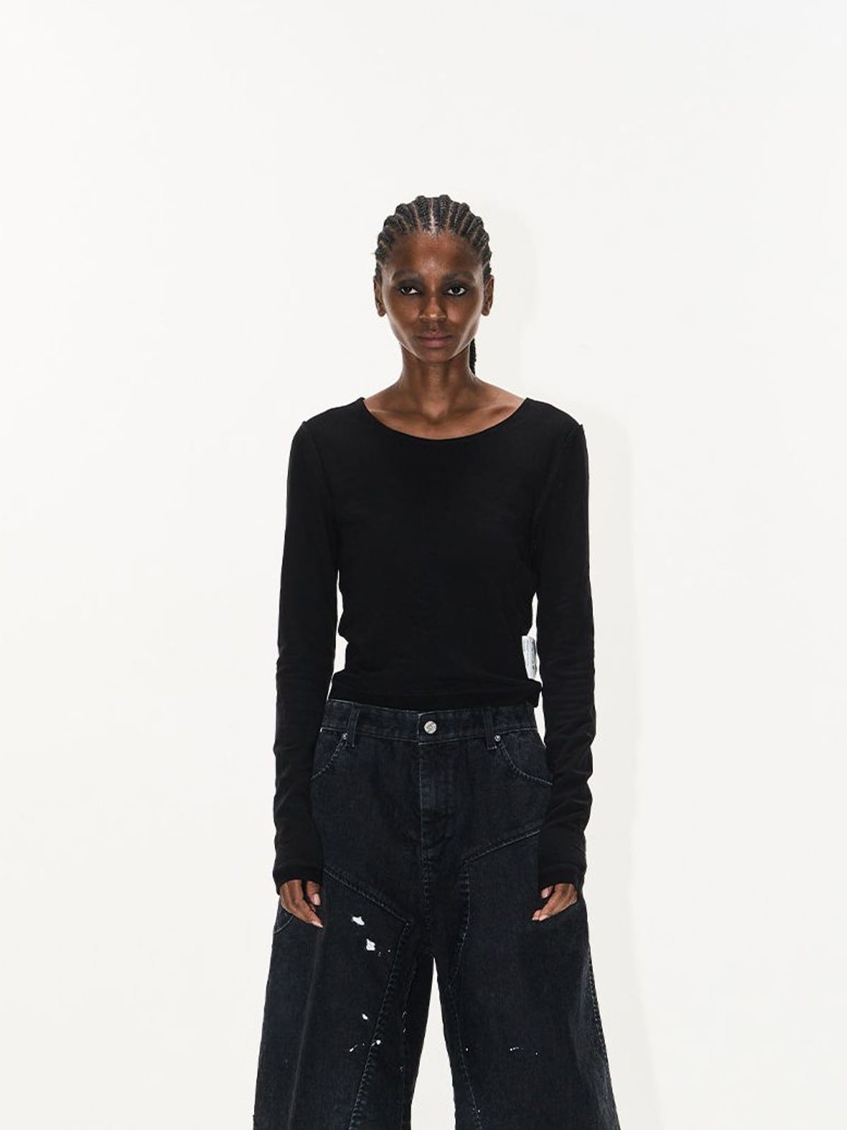 BLINDNOPLAN Ink Splatter Denim Carpenter Shorts in Black - On Female Model