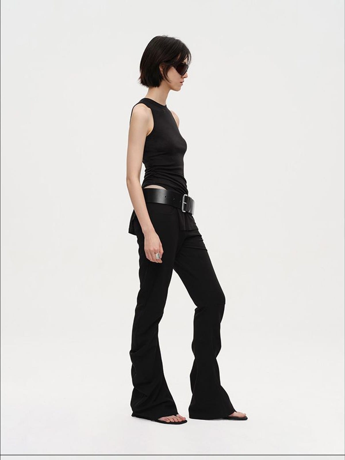 RARELY ALIKE Curved Leg Flared Dress Pants in Black - On Female Model