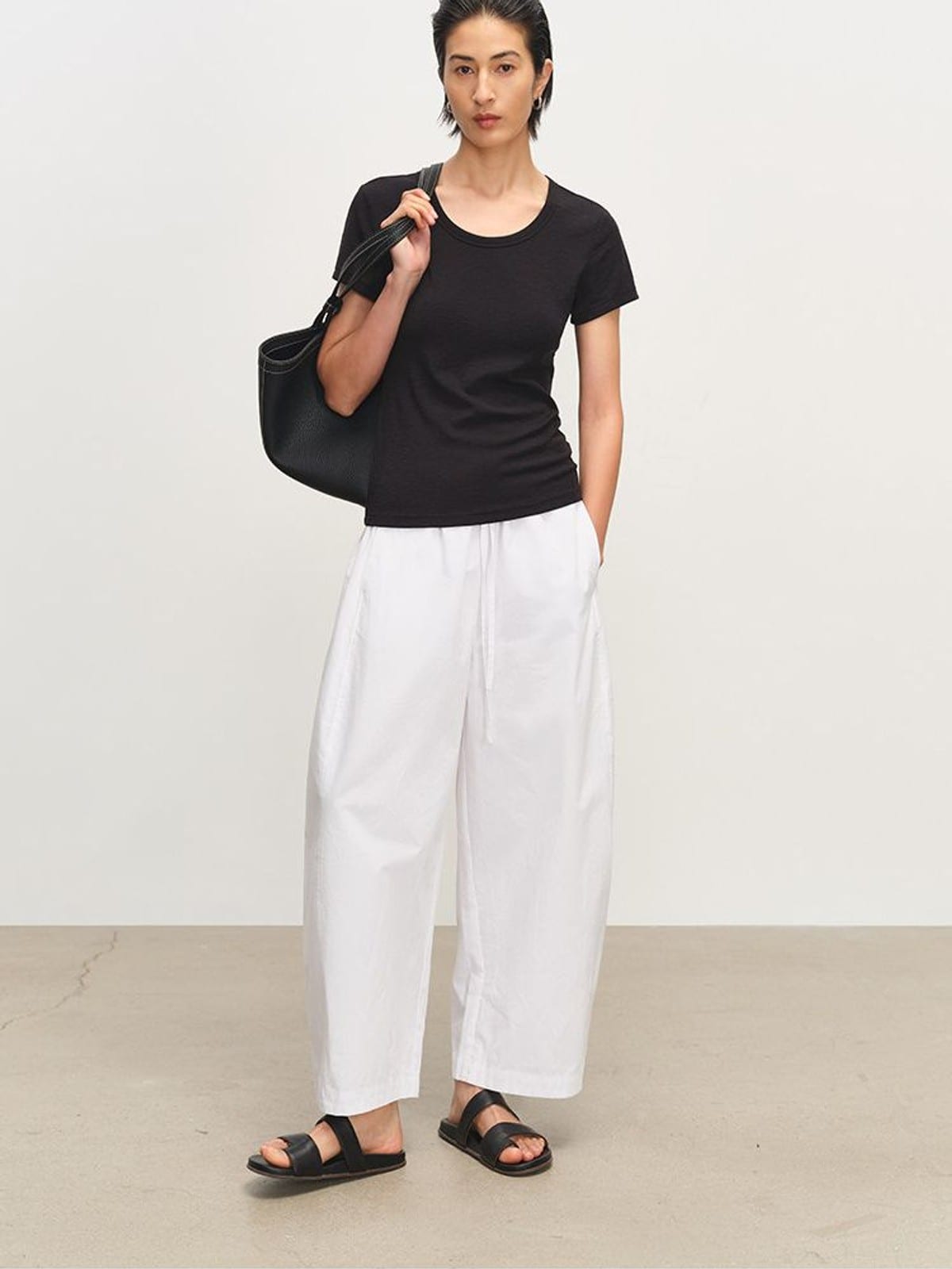 MSBEAST Paper Texture Cotton Balloon Pants in White - On Female Model
