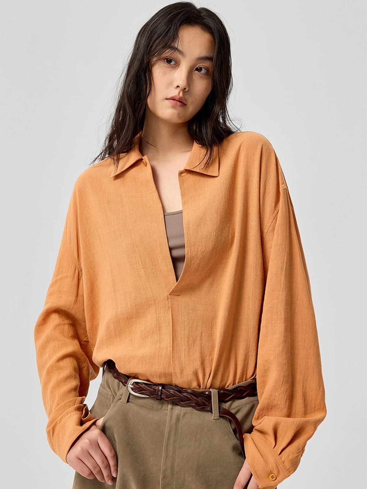 SIMPLE PROJECT Lyocell Ramie Pleated V Neck Shirt in Orange - On Female Model
