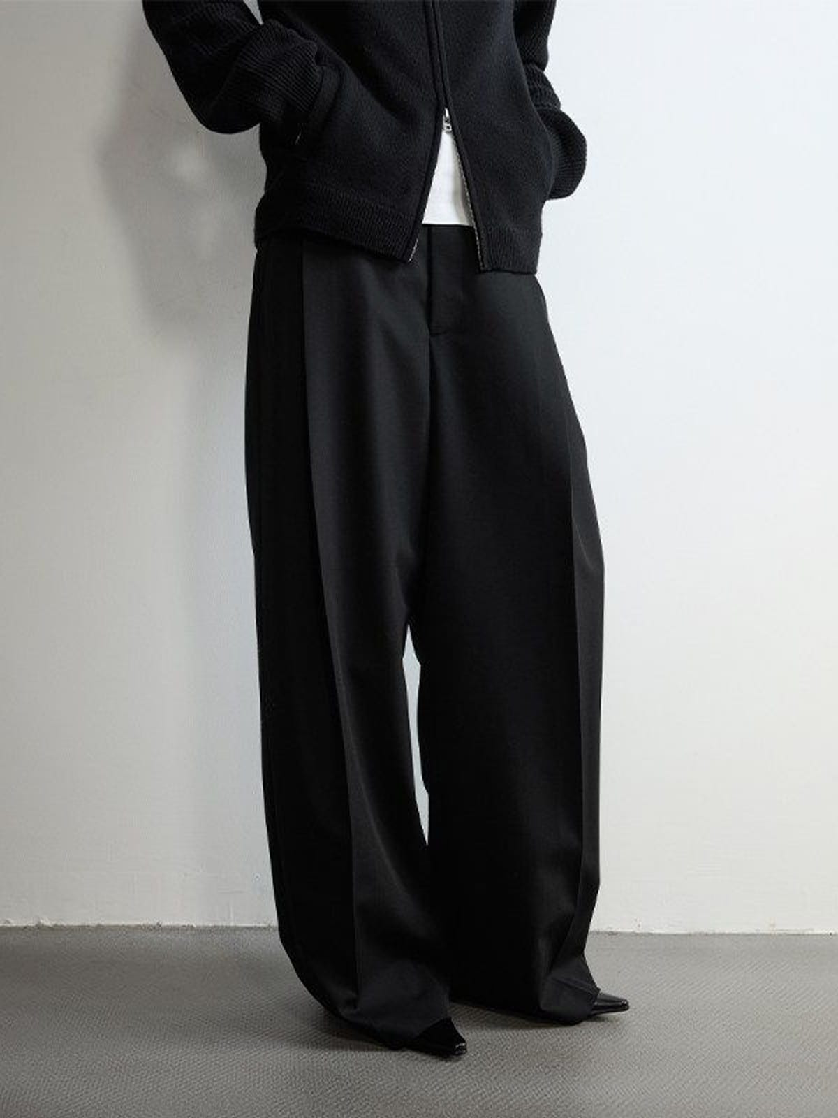 Random Piece Pleated Merino Wool Wide Leg Trousers in Black - On Model