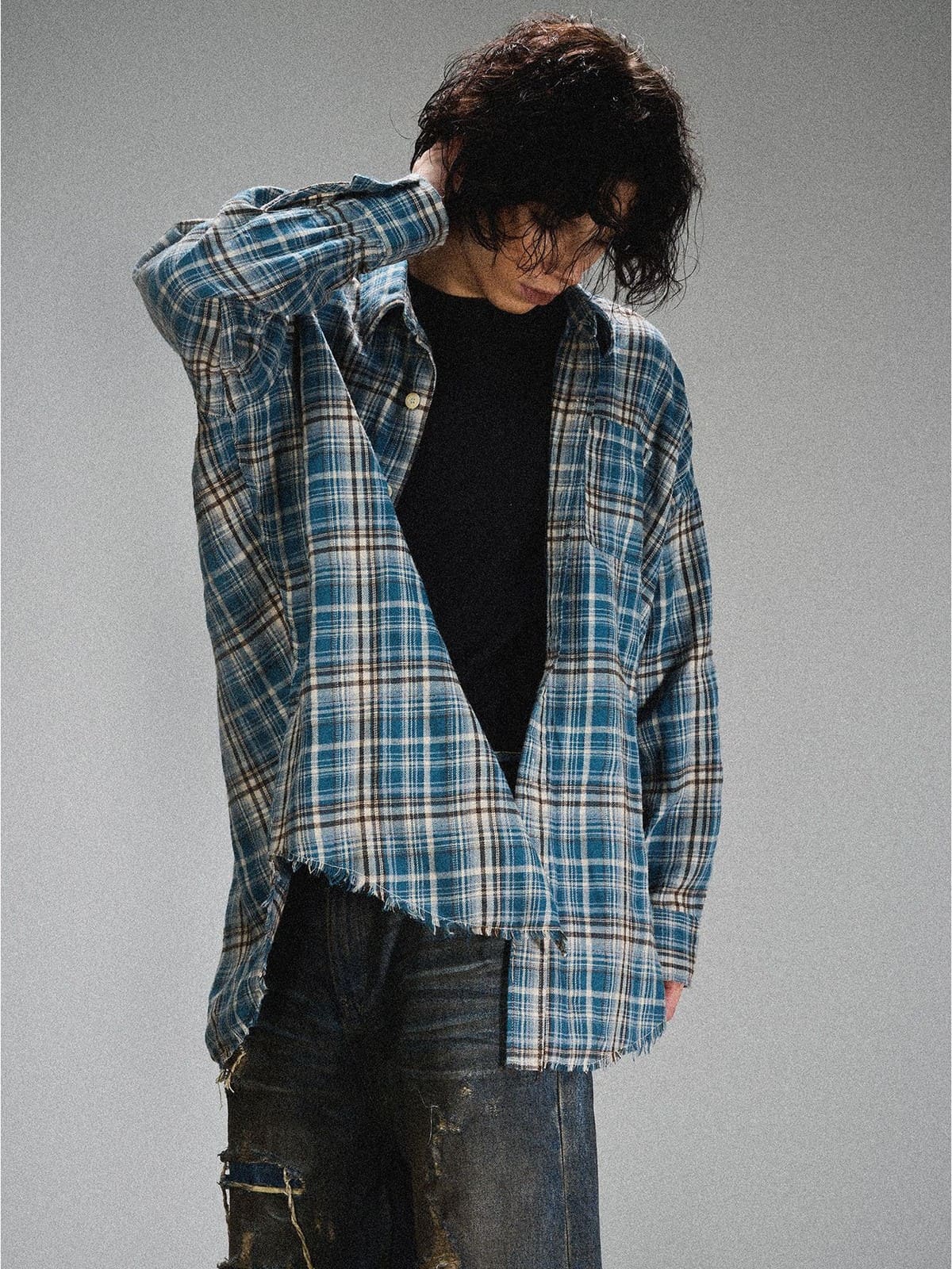 LOSTCTRL Frayed Asymmetric Plaid Shirt in Blue - On Male Model