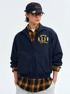 MEDM Nylon Stand Collar Coach Jacket in Navy Blue - On Male Model