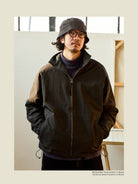 USAGE Reversible Nylon Fleece Track Jacket in Black - On Male Model