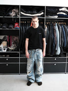 UNKNOWNWORLD Small Logo Cotton T Shirt in Black - On Male Model