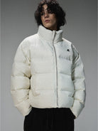 LOSTCTRL Minimalist Nylon Puffer Jacket in Cream - On Male Model