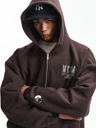 MEDM 3D Logo Two Way Zip Cotton Hoodie in Brown - On Male Model