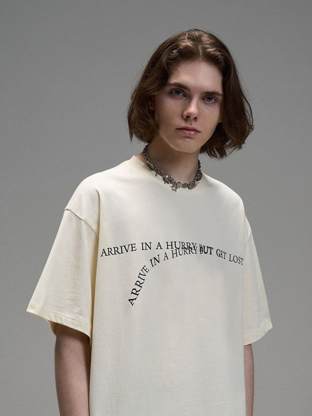 LOSTCTRL Heavyweight Letter Print T Shirt in Cream - On Male Model