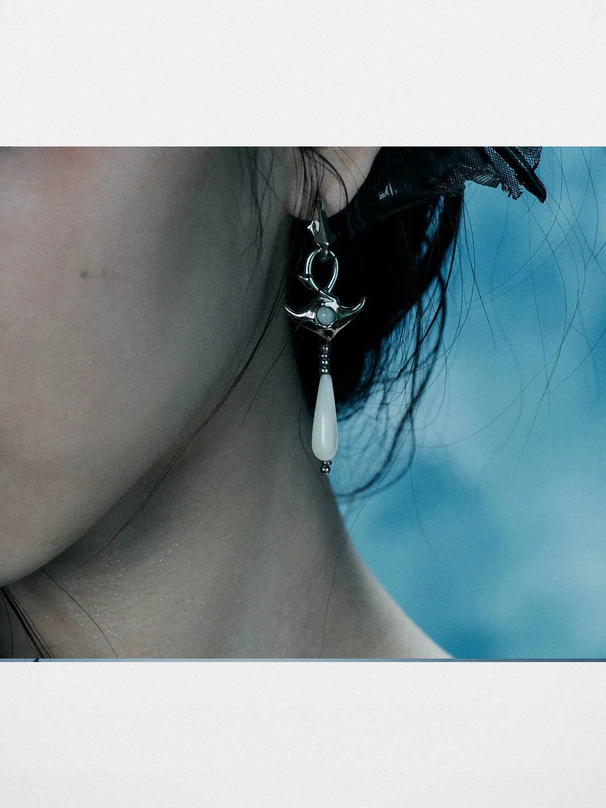 BLACKHEAD Manta Ray Mother of Pearl Drop Earrings in Silver - On Female Model