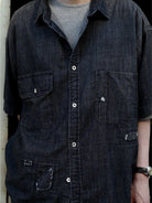 USAGE Distressed Short Sleeve Denim Shirt in Gray - On Male Model