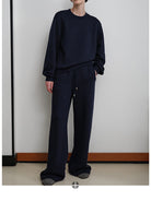 MSBEAST Fleece Lined Cotton Sweatshirt Pants Set in Navy Blue - On Female Model