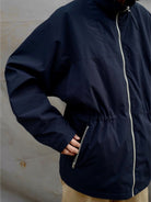 USAGE Drawstring Zip Front Tech Anorak in Navy Blue - On Male Model