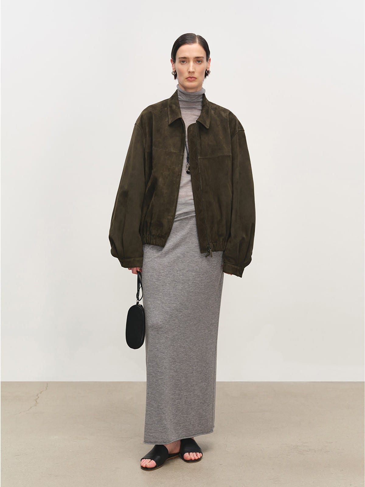 MSBEAST Broad Shoulder Sheepskin Jacket in Olive - On Female Model