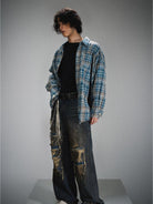 LOSTCTRL Frayed Asymmetric Plaid Shirt in Blue - On Male Model