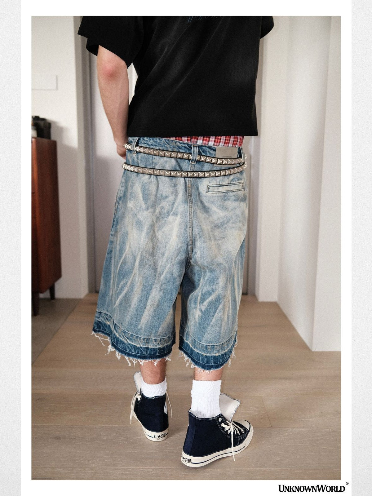 UNKNOWNWORLD Distressed Wash Baggy Shorts in Blue - On Male Model