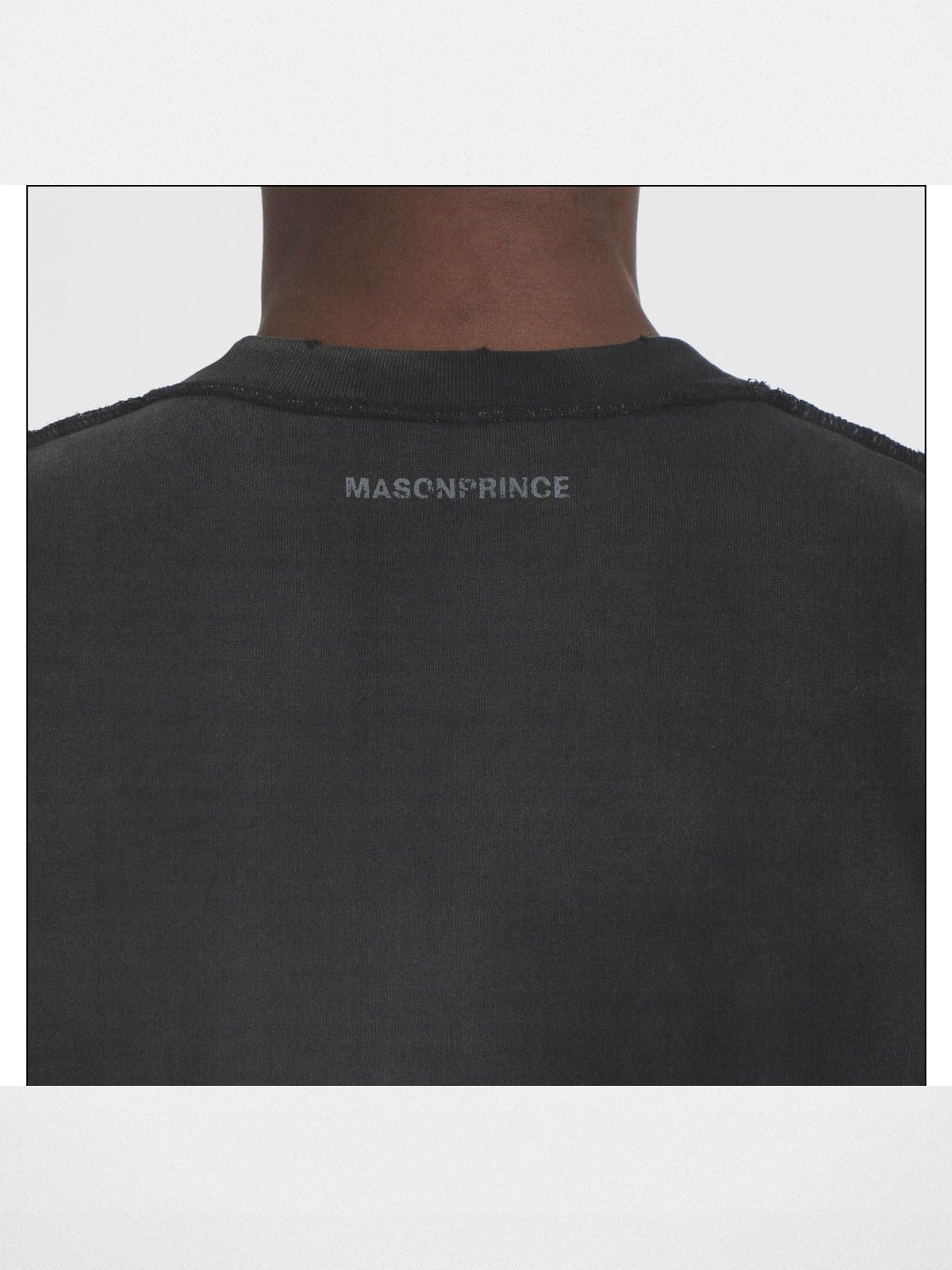MASONPRINCE Distressed Typographic Cotton T Shirt in Black - On Male Model