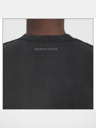 MASONPRINCE Distressed Typographic Cotton T Shirt in Black - On Male Model