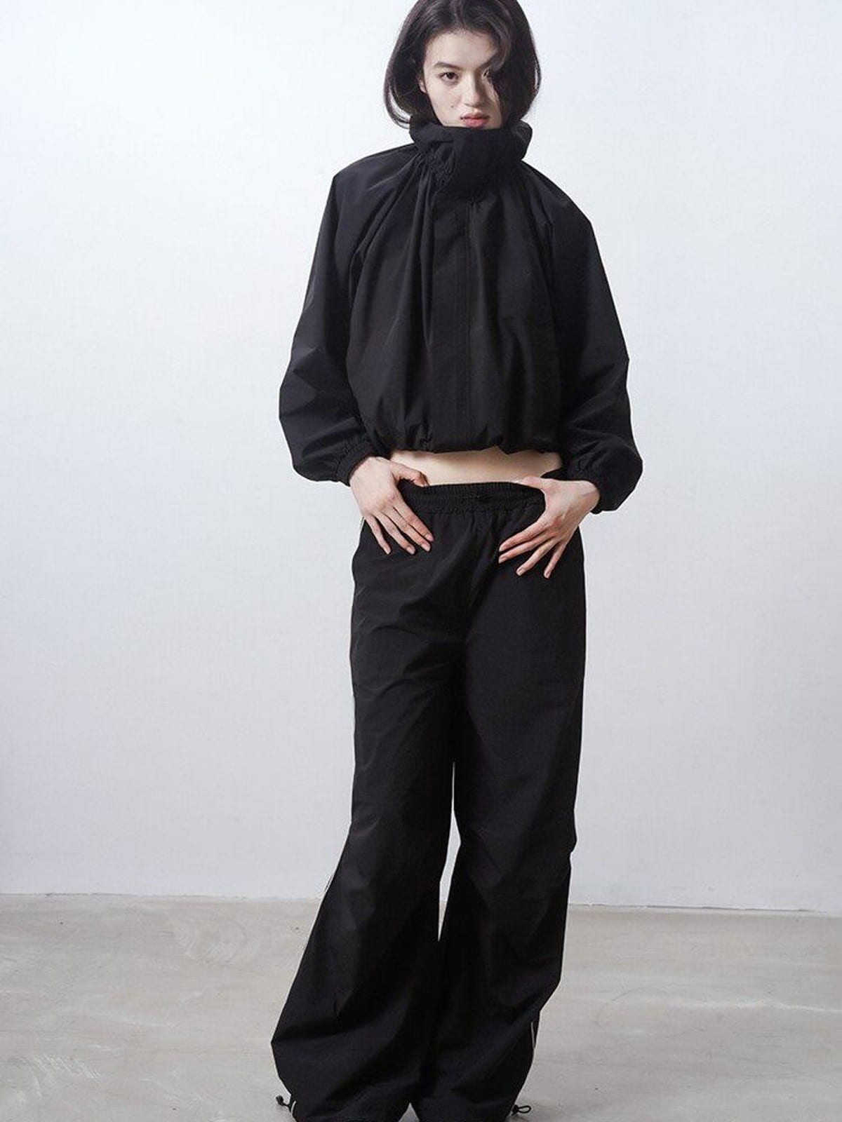 RARELY ALIKE Adjustable Collar Balloon Sports Jacket in Black - On Female Model