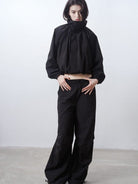 RARELY ALIKE Adjustable Collar Balloon Sports Jacket in Black - On Female Model