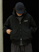 USAGE Crinkle Nylon Hooded Track Jacket in Black - On Male Model