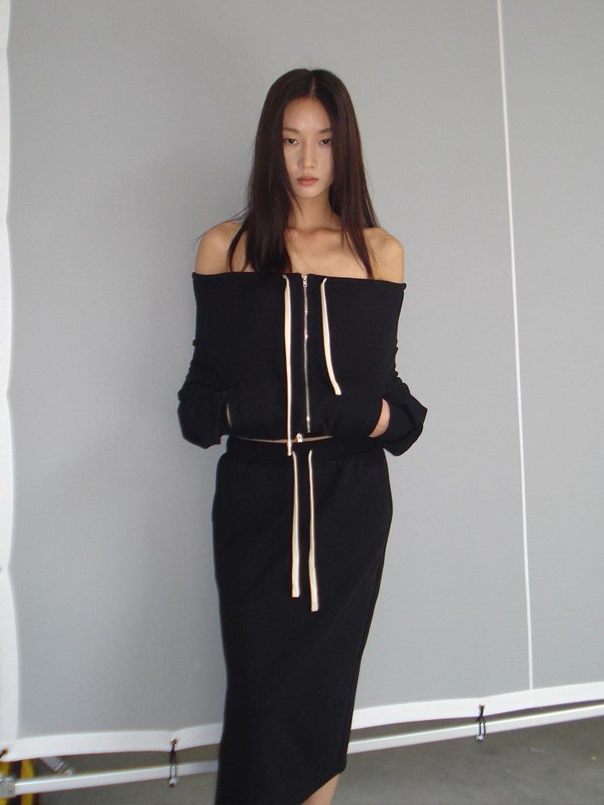 RARELY ALIKE Off Shoulder Zip Up Sweatshirt in Black - On Female Model