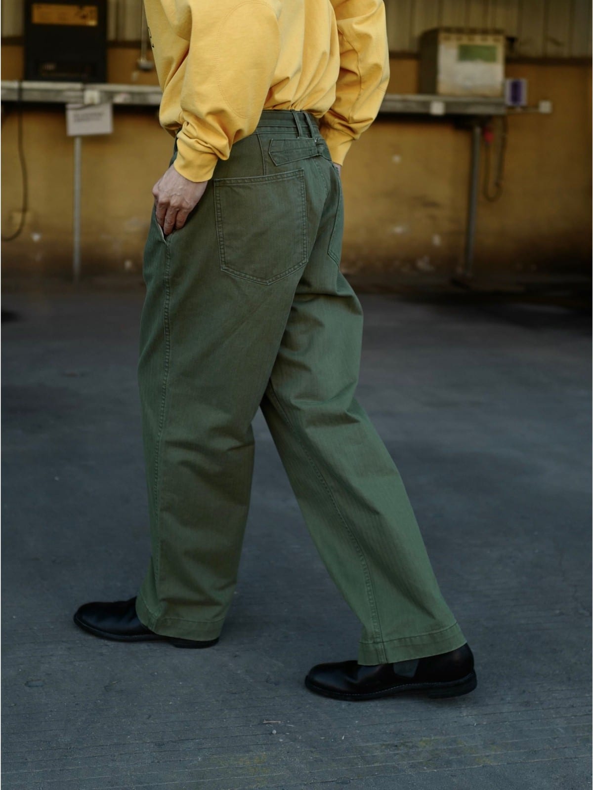 USAGE Heavyweight Herringbone Twill Belted Trousers in Olive - On Model
