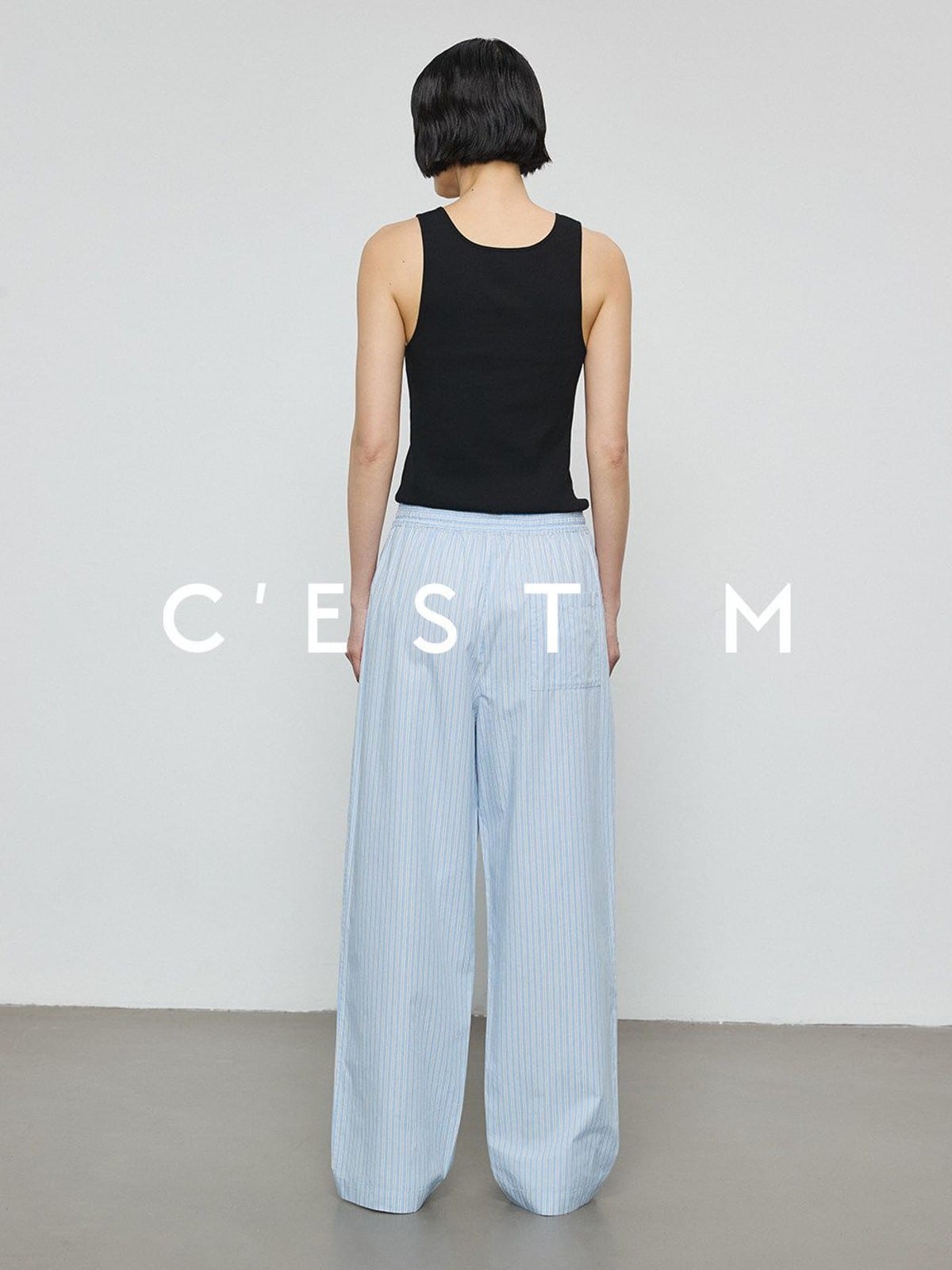 CEST M Striped Pima Cotton Shirt Pants Set in Sky Blue - On Female Model