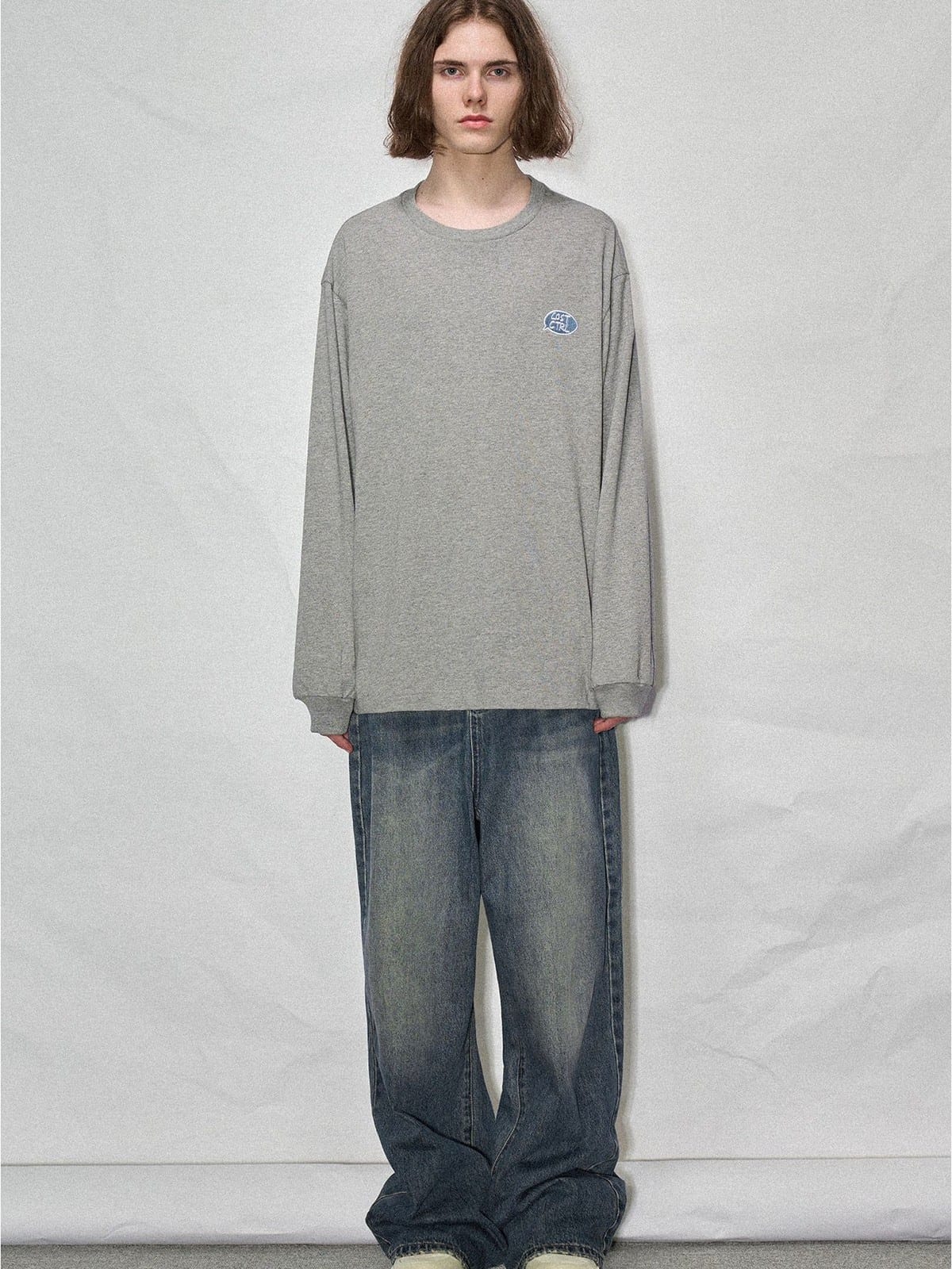 LOSTCTRL Embroidered Long Sleeve Cotton T Shirt in Gray - On Male Model