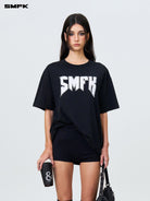 SMFK Metallic Logo Cotton T Shirt in Black - On Female Model