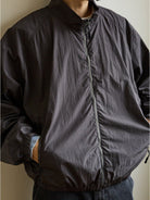 USAGE Lightweight Nylon Zip Up Jacket in Gray - On Male Model