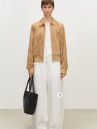 MSBEAST Top Grain Sheepskin Collared Bomber in Beige - On Female Model