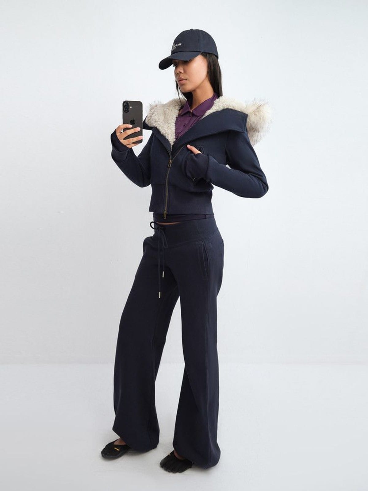 RARELY ALIKE Asymmetrical Faux Fur Trim Padded Jacket in Navy Blue - On Female Model