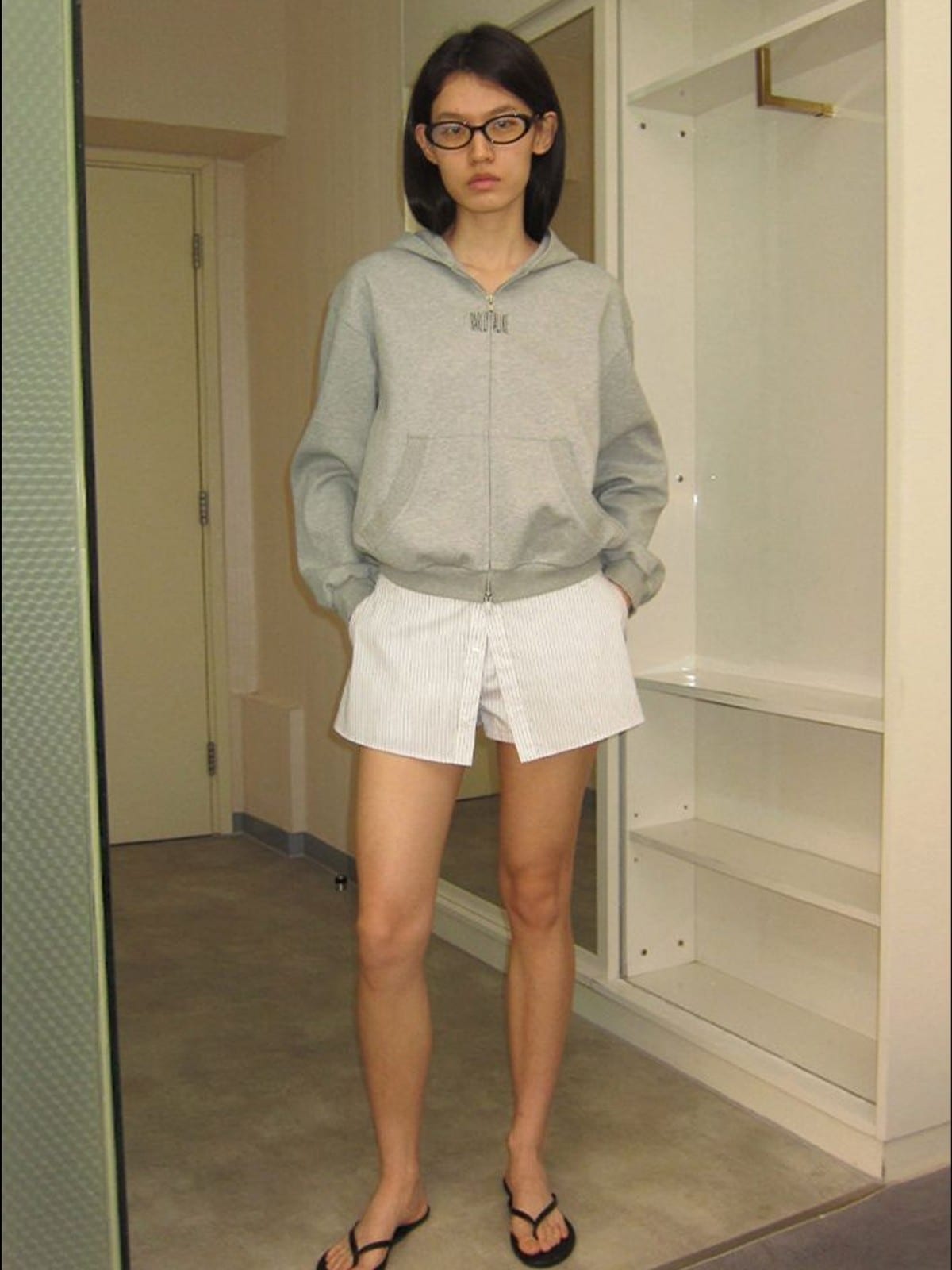 RARELY ALIKE Cinched Waist Logo Zip Up Hoodie in Gray - On Female Model