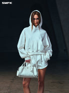 SMFK Meditation Cropped Cotton Hoodie in White - On Female Model