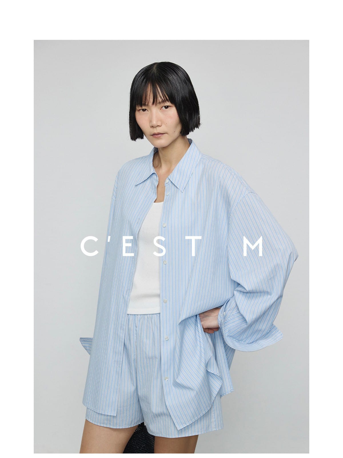 CEST M Striped Organic Pima Cotton Shorts in Sky Blue - On Female Model