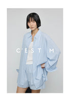 CEST M Striped Organic Pima Cotton Shorts in Sky Blue - On Female Model